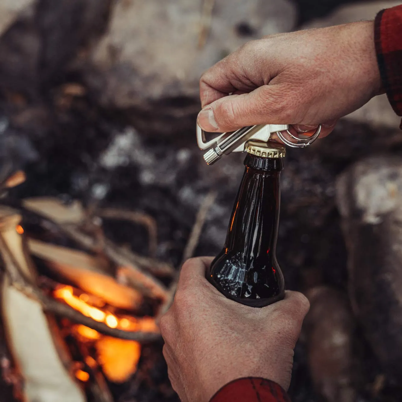 Built-in bottle opener in use